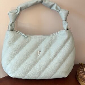 Elegant Light Blue Quilted Handbag